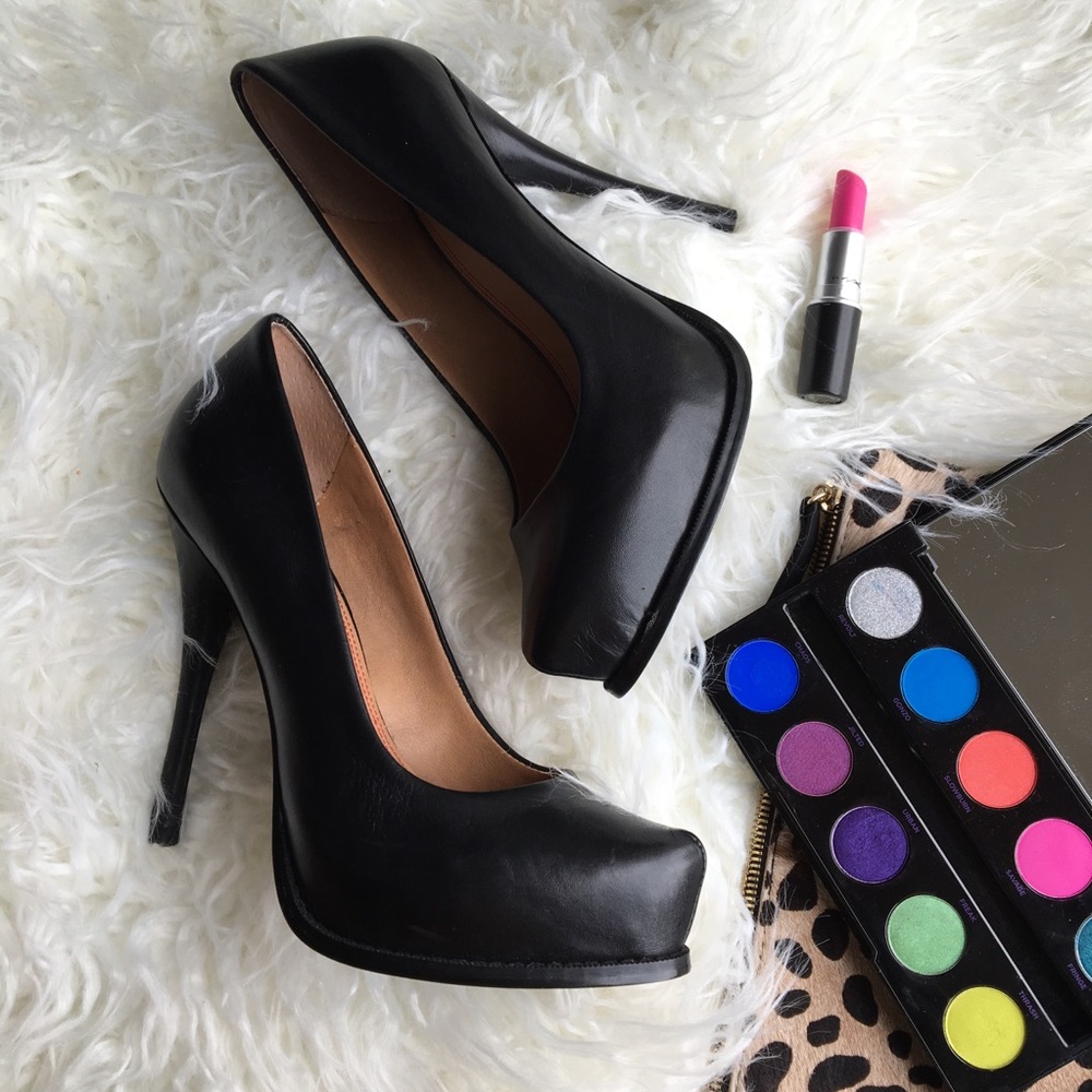 Black leather platform pumps